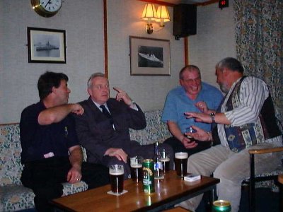 Simon Pierce, Mick Dutson, Bob Burton and Big Mac exchange banta